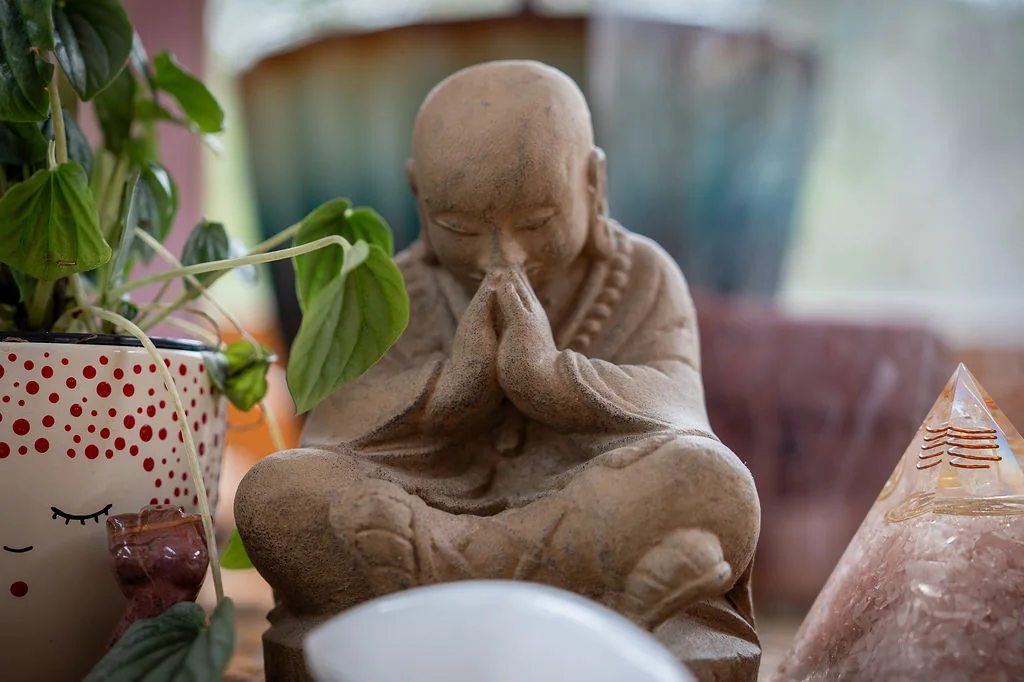 A meditating Buddha statue on the retreat altar