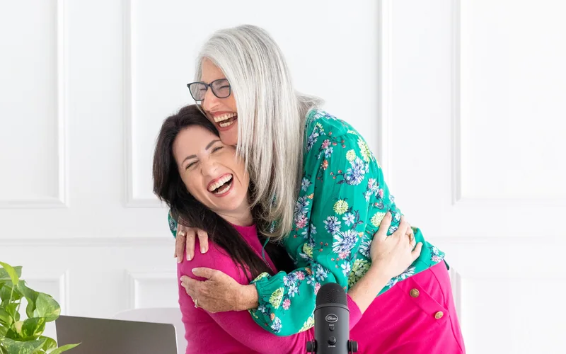 Sarah and her mom, Petey Silveira, hugging and laughing together
